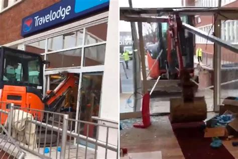 Shocking moment digger driver destroys brand new Travelodge 